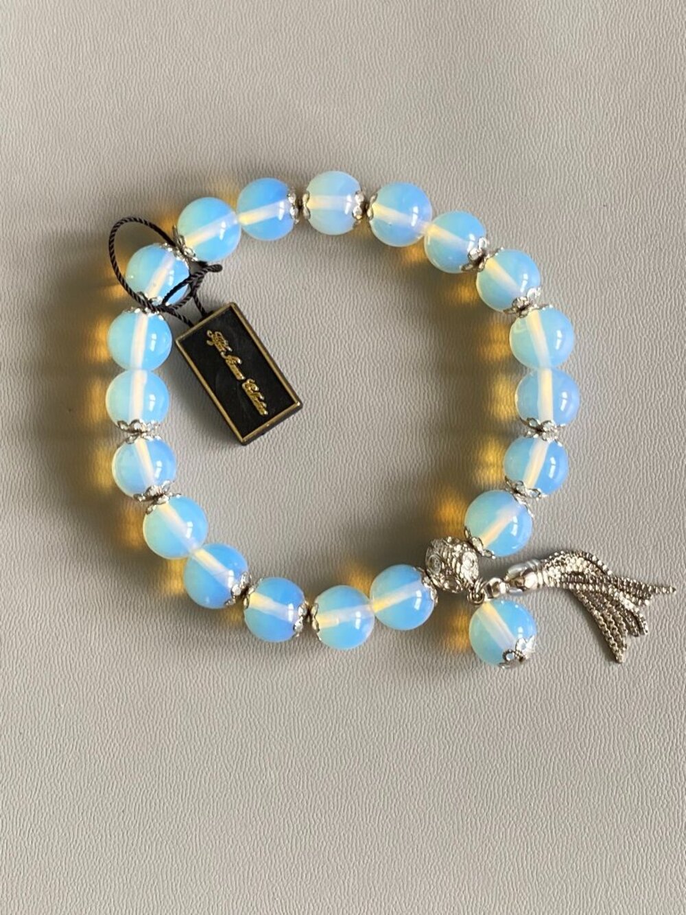 Fifth Avenue NWT Opalite Glass Beaded Stretch Bracelet Silver Filigree Tassel 8"